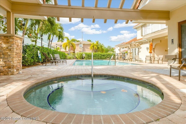 1475 Isabella Dr Unit 101, Melbourne, FL 32935 - community pool with a community hot tub and a patio area