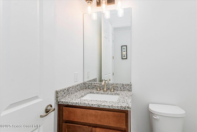 1475 Isabella Dr Unit 101, Melbourne, FL 32935 - half bathroom with toilet and vanity