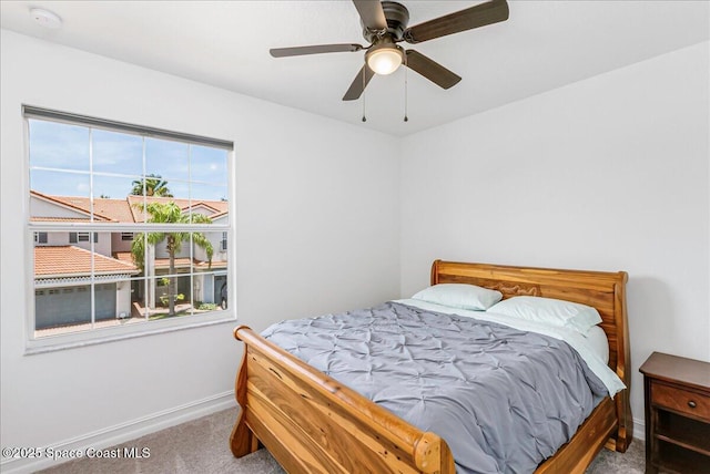 1475 Isabella Dr Unit 101, Melbourne, FL 32935 - bedroom featuring carpet and a ceiling fan