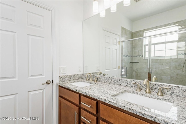 1475 Isabella Dr Unit 101, Melbourne, FL 32935 - bathroom with a shower stall and double vanity