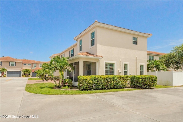 1475 Isabella Dr Unit 101, Melbourne, FL 32935 - view of front of home featuring a tile roof and stucco siding