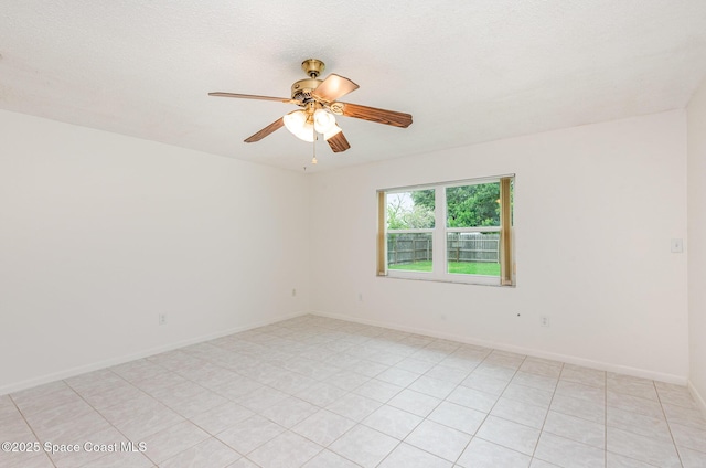 957 Waialae Cir NE, Palm Bay, FL 32905 - spare room featuring ceiling fan and baseboards