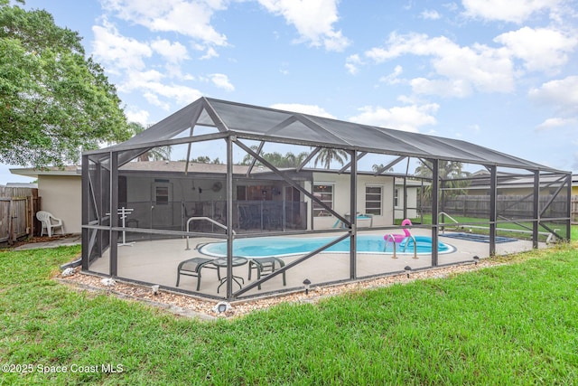 957 Waialae Cir NE, Palm Bay, FL 32905 - view of swimming pool with a patio and glass enclosure