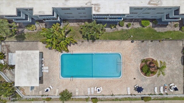 221 Columbia Dr Unit 139, Cape Canaveral, FL 32920 - drone / aerial view of a pool