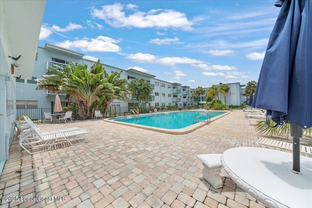 221 Columbia Dr Unit 139, Cape Canaveral, FL 32920 - community pool with a patio