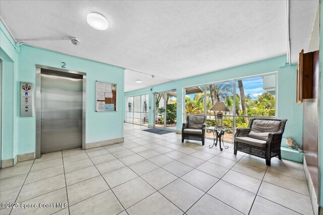 221 Columbia Dr Unit 139, Cape Canaveral, FL 32920 - lobby featuring a textured ceiling