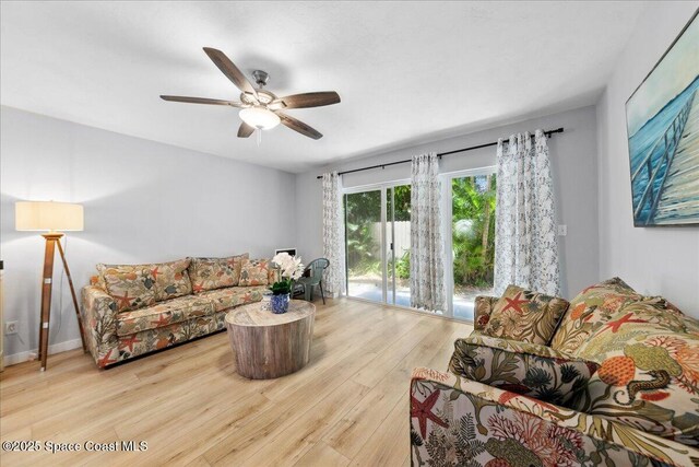 221 Columbia Dr Unit 139, Cape Canaveral, FL 32920 - living room featuring wood finished floors and ceiling fan