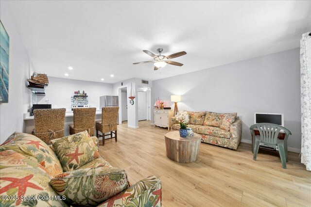 221 Columbia Dr Unit 139, Cape Canaveral, FL 32920 - living room featuring ceiling fan, light wood-style flooring, and recessed lighting