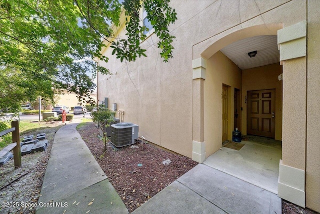 4047 Meander Pl Unit 208, Rockledge, FL 32955 - property entrance with stucco siding