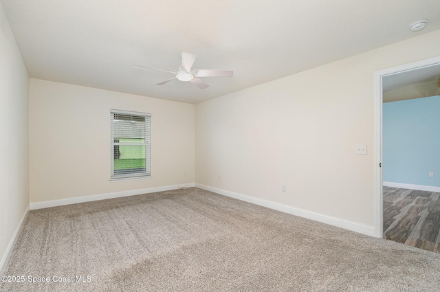 2111 Spring Creek Cir, Palm Bay, FL 32905 - carpeted spare room featuring a ceiling fan, baseboards, and a smoke detector