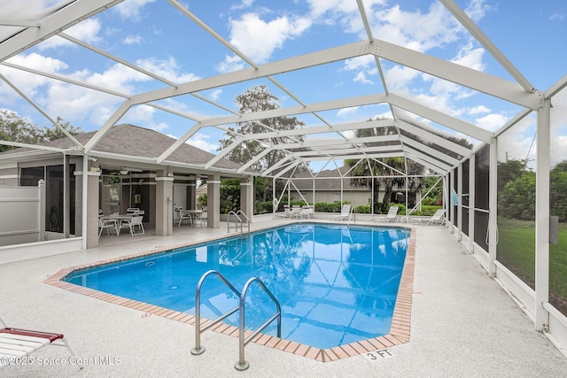 2111 Spring Creek Cir, Palm Bay, FL 32905 - swimming pool featuring a patio, a ceiling fan, and a lanai