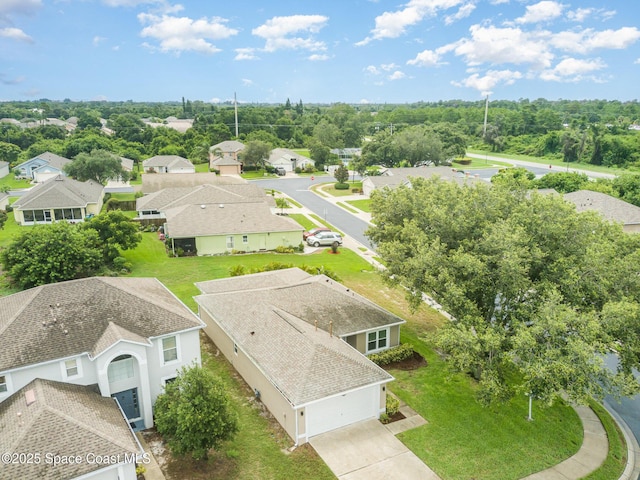2111 Spring Creek Cir, Palm Bay, FL 32905 - aerial view of residential area with a tree filled landscape
