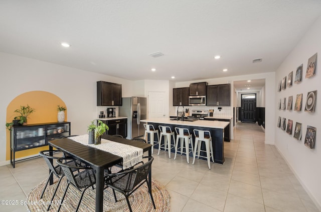 4791 Talbot Blvd, Cocoa, FL 32926 - dining space featuring light tile patterned floors and recessed lighting