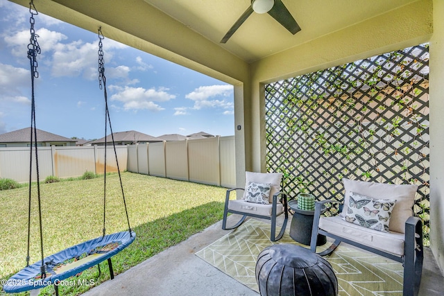 4791 Talbot Blvd, Cocoa, FL 32926 - fenced backyard with ceiling fan and a patio area