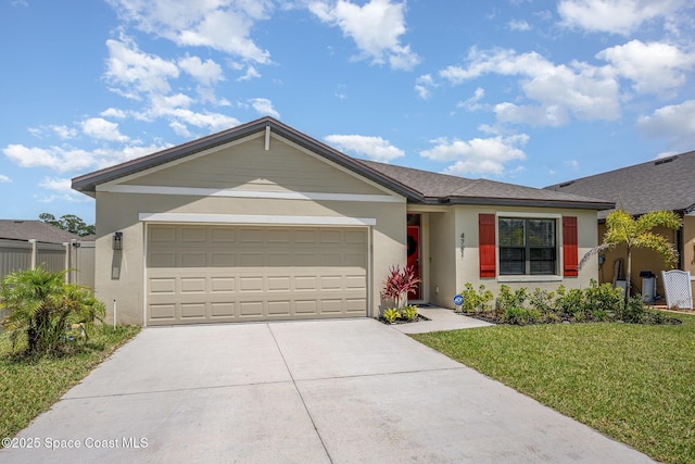 4791 Talbot Blvd, Cocoa, FL 32926 - ranch-style home featuring driveway, a garage, a front yard, and stucco siding