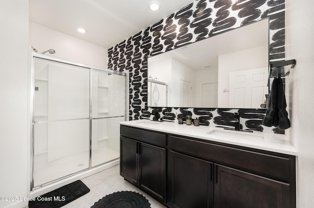 4791 Talbot Blvd, Cocoa, FL 32926 - bathroom featuring a shower stall, double vanity, and tile patterned flooring