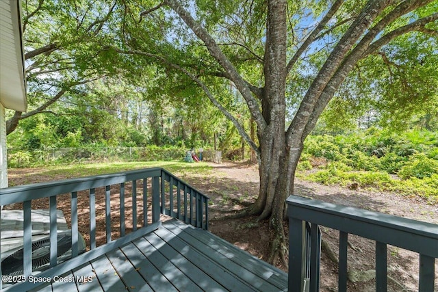 501 Santo Domingo Ave SW, Palm Bay, FL 32908 - deck with a playground and a fenced backyard