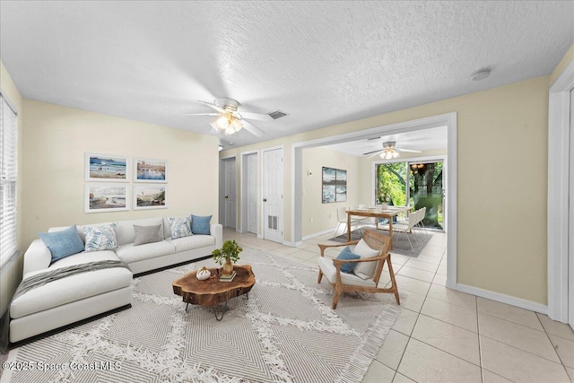 501 Santo Domingo Ave SW, Palm Bay, FL 32908 - living room featuring light tile patterned flooring and a ceiling fan