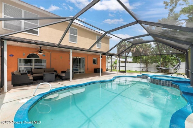 6735 Grissom Pkwy, Cocoa, FL 32927 - view of pool with outdoor lounge area, a patio area, a fenced backyard, a pool with connected hot tub, and a ceiling fan