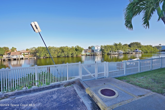 250 N Banana River Dr Unit H-8, Merritt Island, FL 32952 - view of patio with a water view