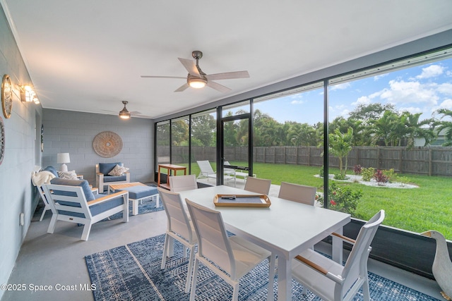 1237 Glenham Dr NE, Palm Bay, FL 32905 - sunroom with ceiling fan and outdoor dining space