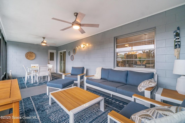 1237 Glenham Dr NE, Palm Bay, FL 32905 - living area with ceiling fan and finished concrete floors