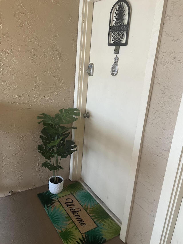 231 Bristol Ct Unit 231, Melbourne, FL 32935 - property entrance with stucco siding