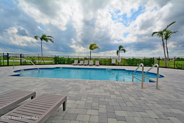 3466 Rixford Way, Palm Bay, FL 32909 - community pool featuring a patio
