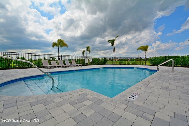 3466 Rixford Way, Palm Bay, FL 32909 - community pool featuring a patio