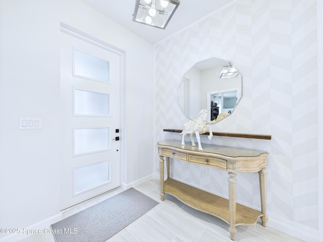 3466 Rixford Way, Palm Bay, FL 32909 - foyer featuring wallpapered walls and baseboards