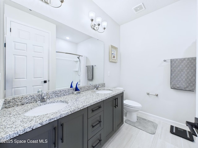 3466 Rixford Way, Palm Bay, FL 32909 - full bathroom with double vanity, toilet, baseboards, and a shower