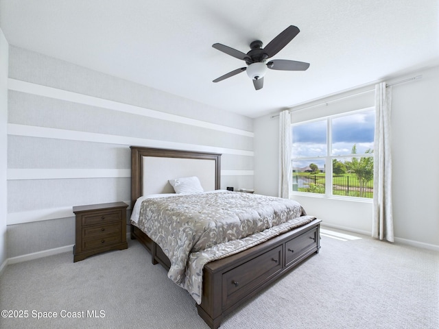 3466 Rixford Way, Palm Bay, FL 32909 - bedroom with light colored carpet, baseboards, and ceiling fan
