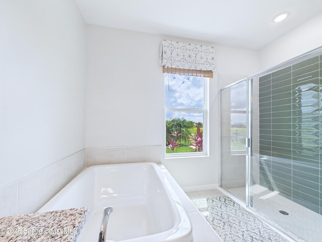 3466 Rixford Way, Palm Bay, FL 32909 - full bathroom with a garden tub, a shower stall, tile patterned floors, and recessed lighting