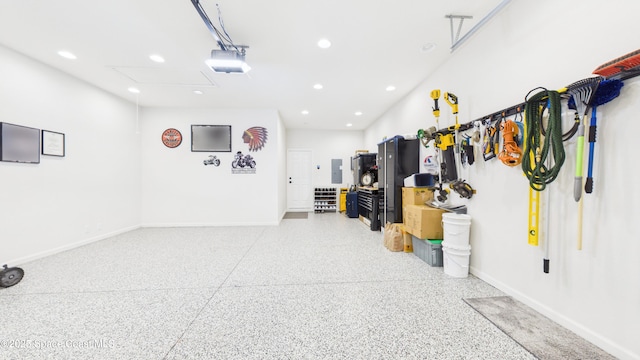 3466 Rixford Way, Palm Bay, FL 32909 - garage featuring a garage door opener, baseboards, and recessed lighting