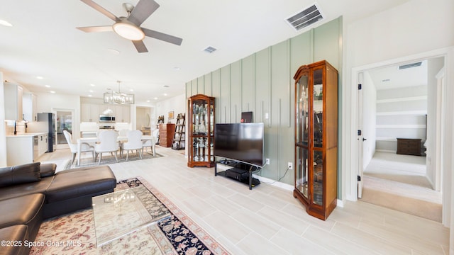 3466 Rixford Way, Palm Bay, FL 32909 - living area with a chandelier and ceiling fan