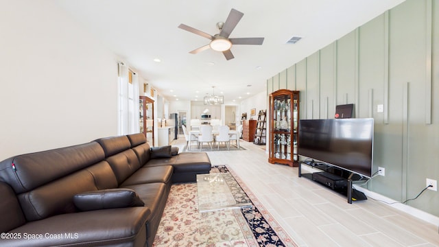 3466 Rixford Way, Palm Bay, FL 32909 - living room with a ceiling fan, a chandelier, and recessed lighting