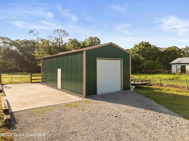 3373 Stratos Ln, Palm Bay, FL 32909 - detached garage featuring driveway