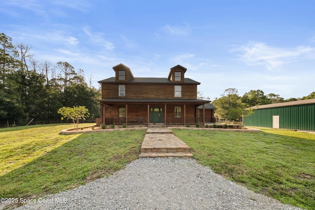 3373 Stratos Ln, Palm Bay, FL 32909 - log cabin with covered porch and a front lawn