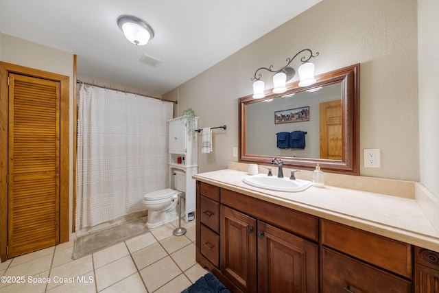3373 Stratos Ln, Palm Bay, FL 32909 - bathroom featuring toilet, vanity, tile patterned floors, and a shower with shower curtain