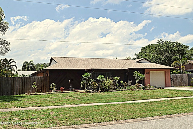 630 Venetian Way, Merritt Island, FL 32953 - single story home with a garage, concrete driveway, and roof with shingles