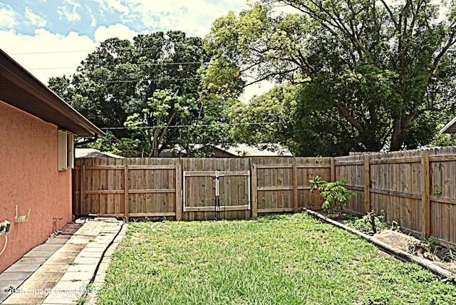 630 Venetian Way, Merritt Island, FL 32953 - view of yard with a gate