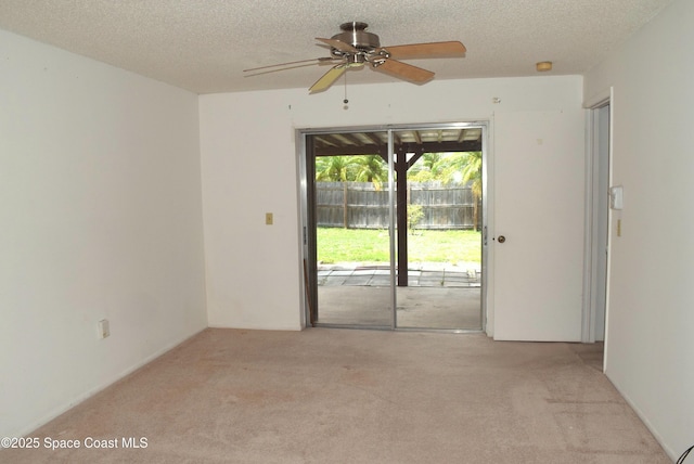 630 Venetian Way, Merritt Island, FL 32953 - unfurnished room with carpet, a textured ceiling, and ceiling fan