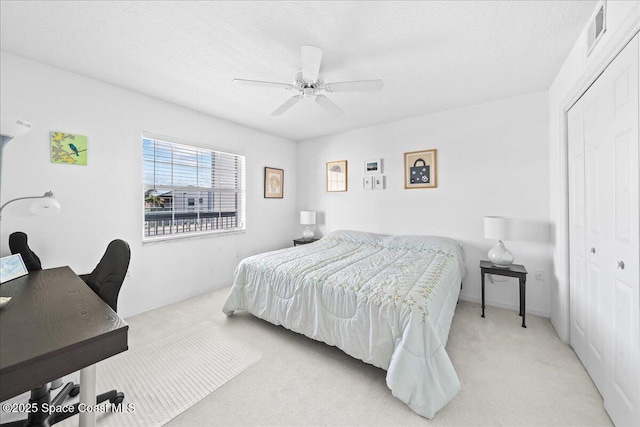 660 S Brevard Ave Unit 1535, Cocoa Beach, FL 32931 - bedroom with light carpet, a closet, an office area, and ceiling fan