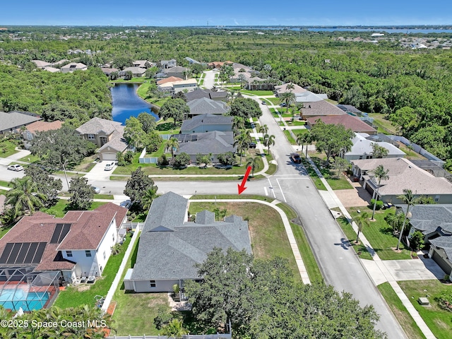 310 Chennault Ln, Rockledge, FL 32955 - aerial perspective of suburban area featuring a large body of water