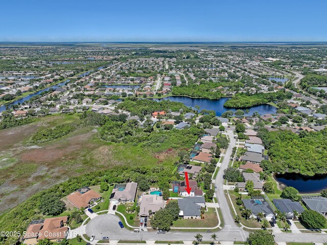310 Chennault Ln, Rockledge, FL 32955 - aerial view of property's location with nearby suburban area and a large body of water