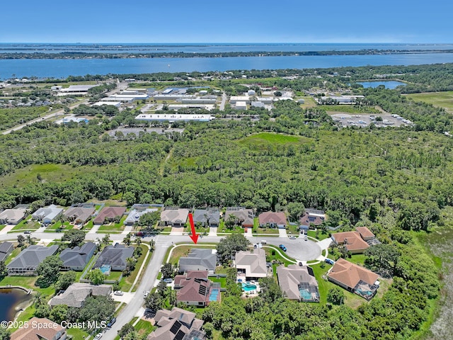 310 Chennault Ln, Rockledge, FL 32955 - aerial view of property's location with a large body of water and nearby suburban area