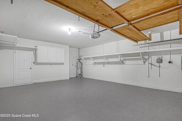 310 Chennault Ln, Rockledge, FL 32955 - garage with gas water heater and a garage door opener