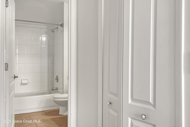 310 Chennault Ln, Rockledge, FL 32955 - bathroom with shower / washtub combination and tile patterned floors