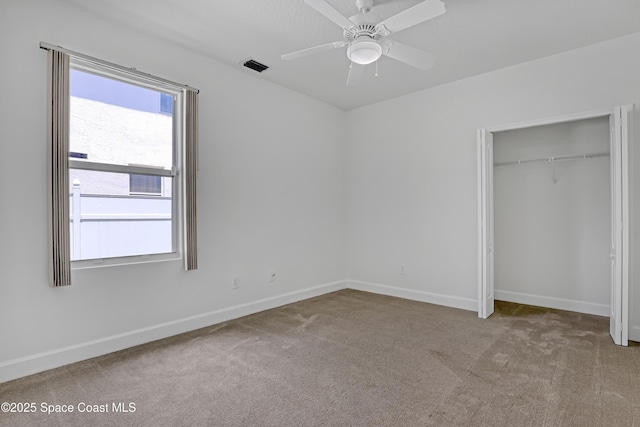 310 Chennault Ln, Rockledge, FL 32955 - unfurnished bedroom with carpet flooring, a closet, and ceiling fan