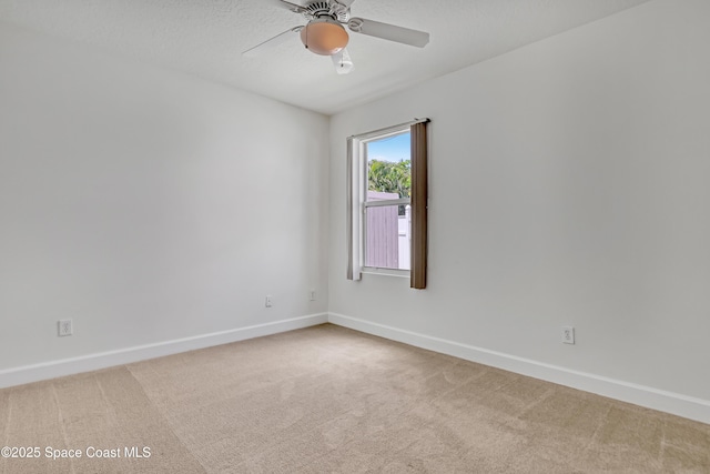 310 Chennault Ln, Rockledge, FL 32955 - carpeted spare room featuring ceiling fan and baseboards